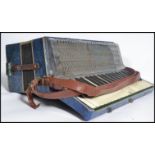A vintage 20th century Apollo accordion musical instrument in original case. Measures 22 cm high and