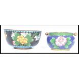 A 19th century Cloisonne bowl along with a later cloisonne revolving ashtray. Measures 5.5 cm high