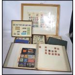 A collection of vintage stamp albums across 3 albums to include a collection of Victorian penny