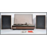 A retro Pye 1557 stereo record player / turntable, lift up perspex lid, three speed record deck