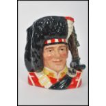 A Royal Doulton character jug 'The Piper', modelled by Stanley James Taylor, D6918, limited