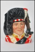 A Royal Doulton character jug 'The Piper', modelled by Stanley James Taylor, D6918, limited