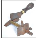 A 19th century Victorian leather working cutting tool. The blade stamped Tixon and Sons.