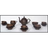A believed early 20th century Asian antique coconut five piece tea set comprising of a teapot, sugar