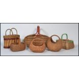 A group of vintage 20th century child's wicker baskets of various form along with a larger