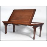 A late 19th / early 20th century folding metamorphic mahogany inlaid galleried bed / reading tray