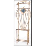 A 19th century Victorian Art Nouveau bamboo hallstand / hall stand. Central diamond mirror with vase