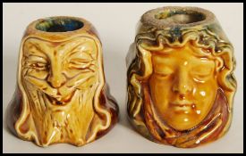 A pair of Royal Doulton Lambeth match strikers. Both being double faced with impressed marks to