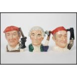 A group of three Royal Doulton large character jugs from Williamsburg to include Blacksmith