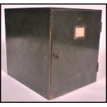 A vintage mid century Industrial green 12 drawer index - storage cubby cabinet. Original British