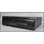 A vintage Pioneer laserdisc laser disc CLD-800 player with built in CD player.
