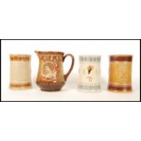 A group of three Doulton commemorative trial tankards for the 1953 Coronation by Agnete Hoy in