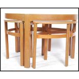 Nathan Furniture - A vintage 1970's teak framed trinity coffee table in the circles pattern having