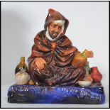 A 20th century Royal Doulton figurine of The Potter HN1493 raised on a square base. Modelled in a