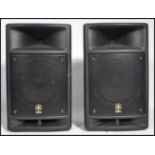 A set of Yamaha Stagepas 300 portable pa system speakers. Measures 48 cm high, 28 cm wide and 25