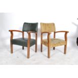 A set of 3 1930's fireside armchairs, each of low form with shaped elbow rests having spring