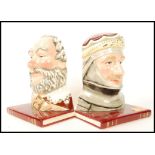 A pair of Royal Doulton bookends, Falstaff D7089, 23cm high, and Henry V D7088, printed marks