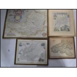 A collection of four framed and glazed 19th and 20th century maps to include a map of Europe drawn