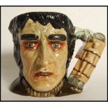 A Royal Doulton large character jug Frankenstein's Monster D7052, limited edition 1485/2500. Note;