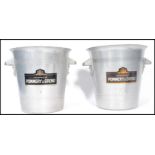 A pair of vintage 20th century Pommery and Greno Champagne wine cooler ice buckets. White metal with