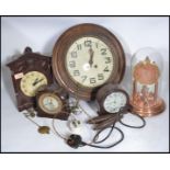 A group of vintage clocks dating from the 19th century to include a school / station clock , glass