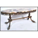 A good mid century Pietra Dura style marble coffee table. Of oval lozenge form having lovely