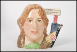 A Royal Doulton large character jug Oscar Wilde D7146 Character Jug of the year 2000. In box with