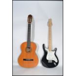A vintage 20th century Ludo electric guitar and an Lenora acoustic guitar musical instrument.