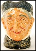 A Royal Doulton character jug entitled ' Toothless Granny '. Doulton designer Harry Fenton 1935 -