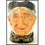 A Royal Doulton character jug entitled ' Toothless Granny '. Doulton designer Harry Fenton 1935 -