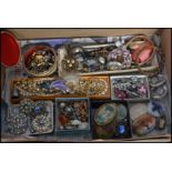 A box of vintage costume jewellery to include necklaces bracelets rhinestone , pictorial ,