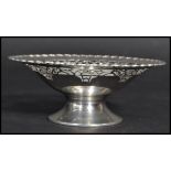 An early 20th century Art Deco silver hallmarked footed bon bon dish. The flared bowl having a