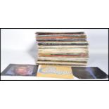 Vinyl Records - A collection of vinyl long play LP's and 12" records featuring various artists to