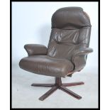 A stunning leather and bentwood swivel armchair in