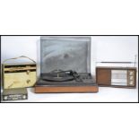 A group of vintage 20th century retro radios , record players etc. along with a pair of vintage
