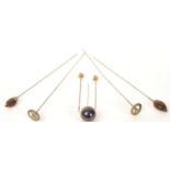 A collection of ladies hat pins dating from the 19th century to include gold examples, two with