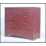 A 19th century Victorian painted pine chest of drawers, two short drawers over three long drawers,