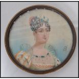 An early 19th century watercolour on ivory portrait miniature painting of Empress Eugenie. The