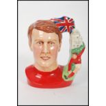 A Royal Doulton character jug depicting Geoff Hurst , Hat Trick Hero D7262 , handle modelled as