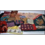 A collection of vintage 20th century silk scarves in the manner of Hermes to include various