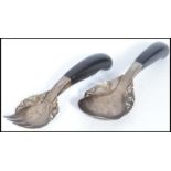 A Chinese silver pair of salad servers serving cutlery having ebonised wooden handles with an