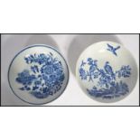 Two 18th century Worcester pearlware pearl ware saucer plates depicting birds and foliage, one