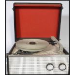 A vintage 20th century 1960's Dansette four speed portable record player in a two - tone finish.