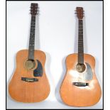 Two 20th century six string acoustic guitars to include a Hohner Arbor  and a Hondo II