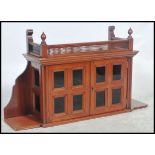 A 19th century Victorian solid mahogany hanging cabinet. The twin door cabinet with multi glass