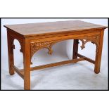 A large 20th century carved oak ecclesiastical communion table. The pugin style table with