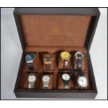 A collection of watches in a presentation watch case to include Constantine Weisz, Admiral Nelson,