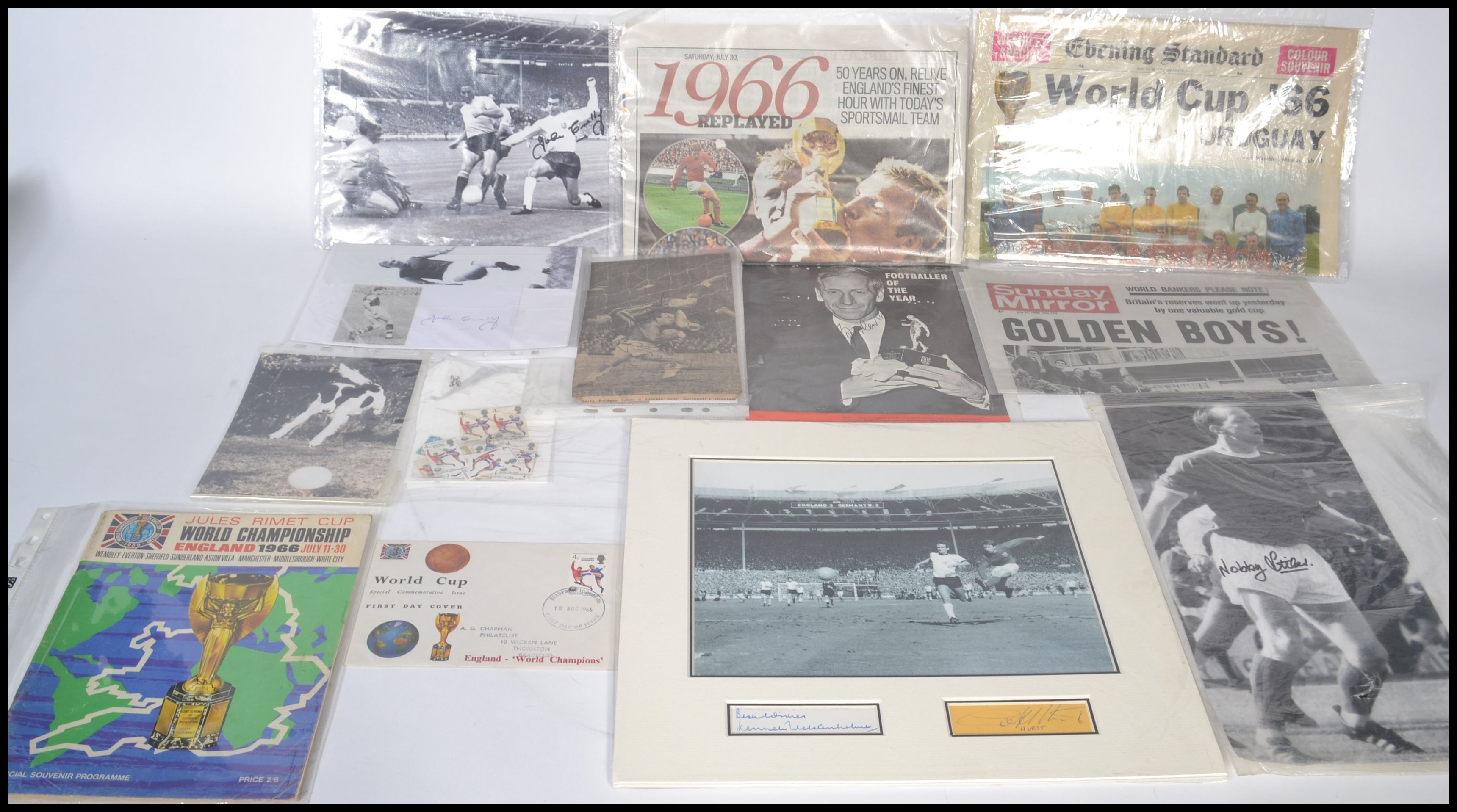 A collection of autographs and ephemera pertaining to the 1966 World Cup to include Bobby Charlton ,