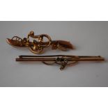Two early 20th century 9ct gold pin brooches one having interwoven foliates the other being set with