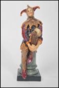 A Royal Doulton figurine entitled ' The Jester ' HN 2016 , 1949 - 1996 early printed green mark,